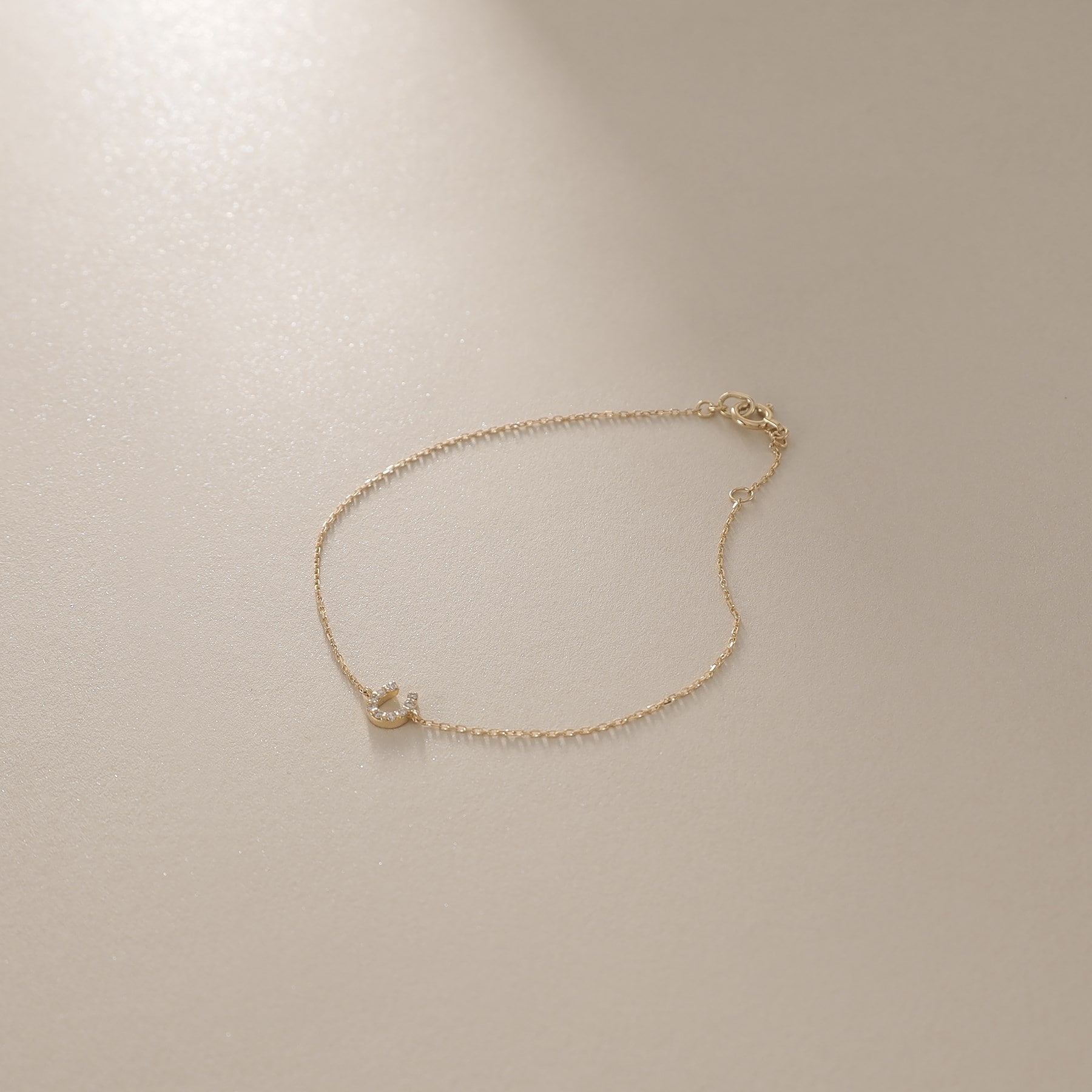 ココシュニック COCOSHNIK K18ダイヤモンド 馬蹄モチーフ ブレスレット (イエローゴールド) イエローゴールド(104)