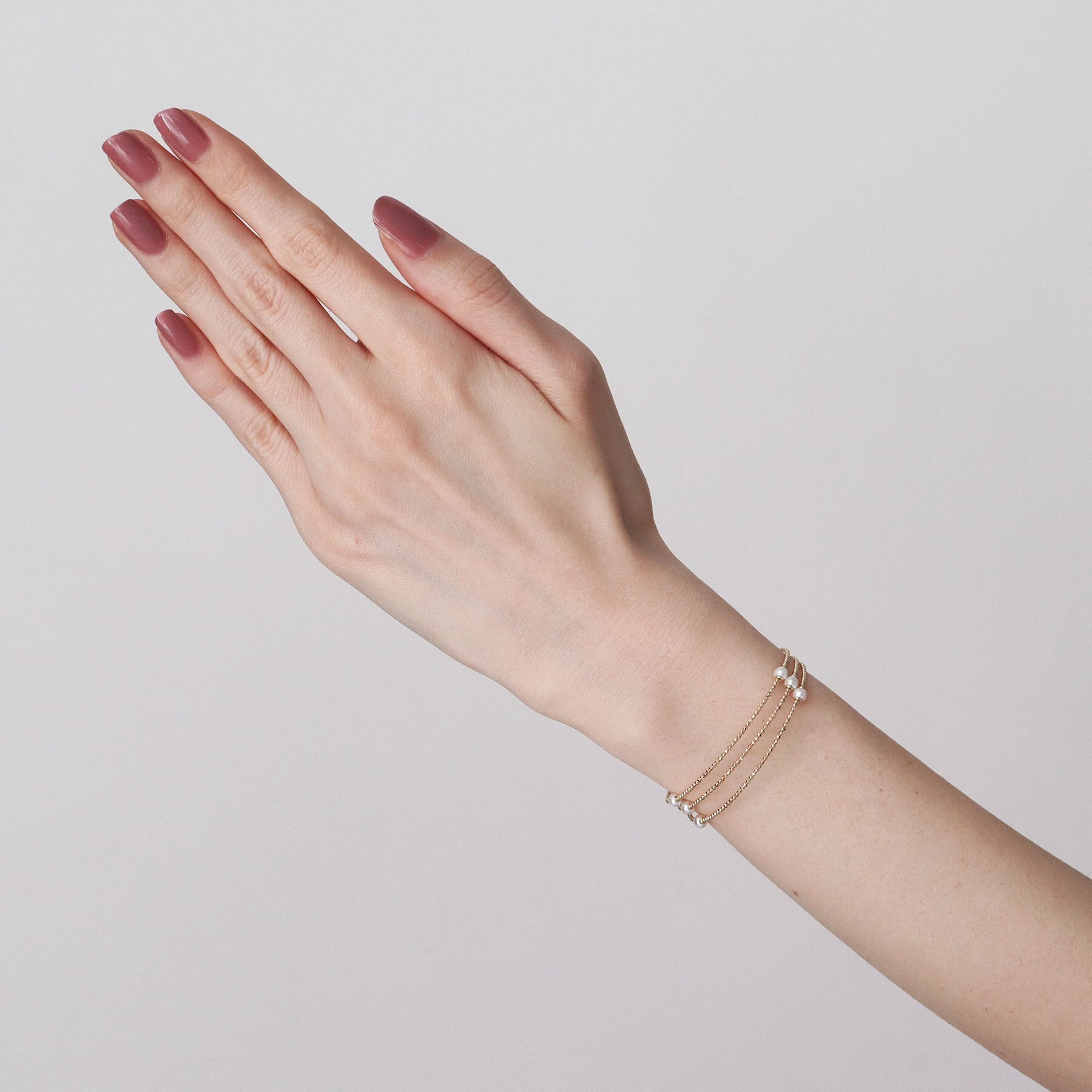 ココシュニック COCOSHNIK K10パール 形状記憶バングル イエローゴールド(106)