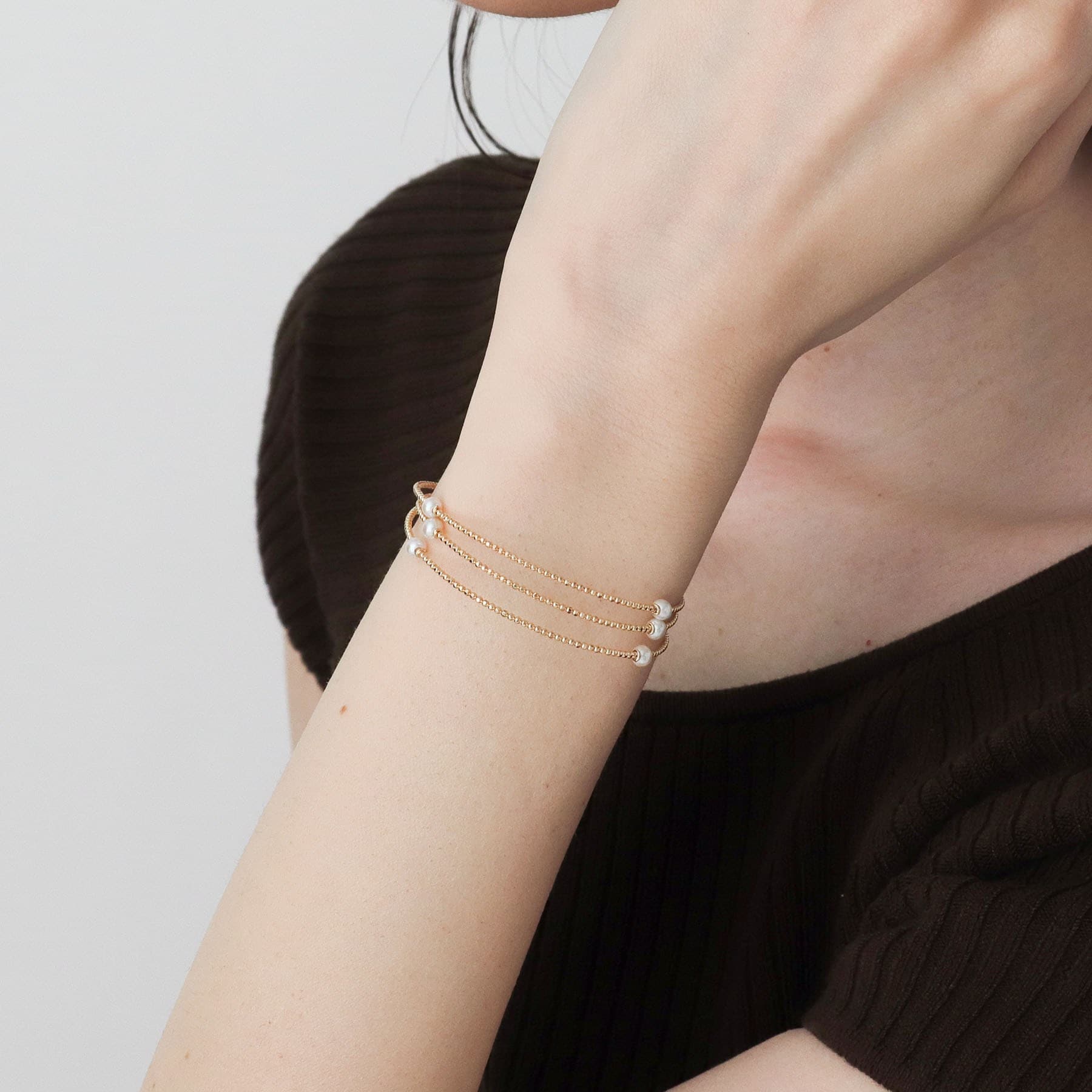 ココシュニック COCOSHNIK K10パール 形状記憶バングル イエローゴールド(106)