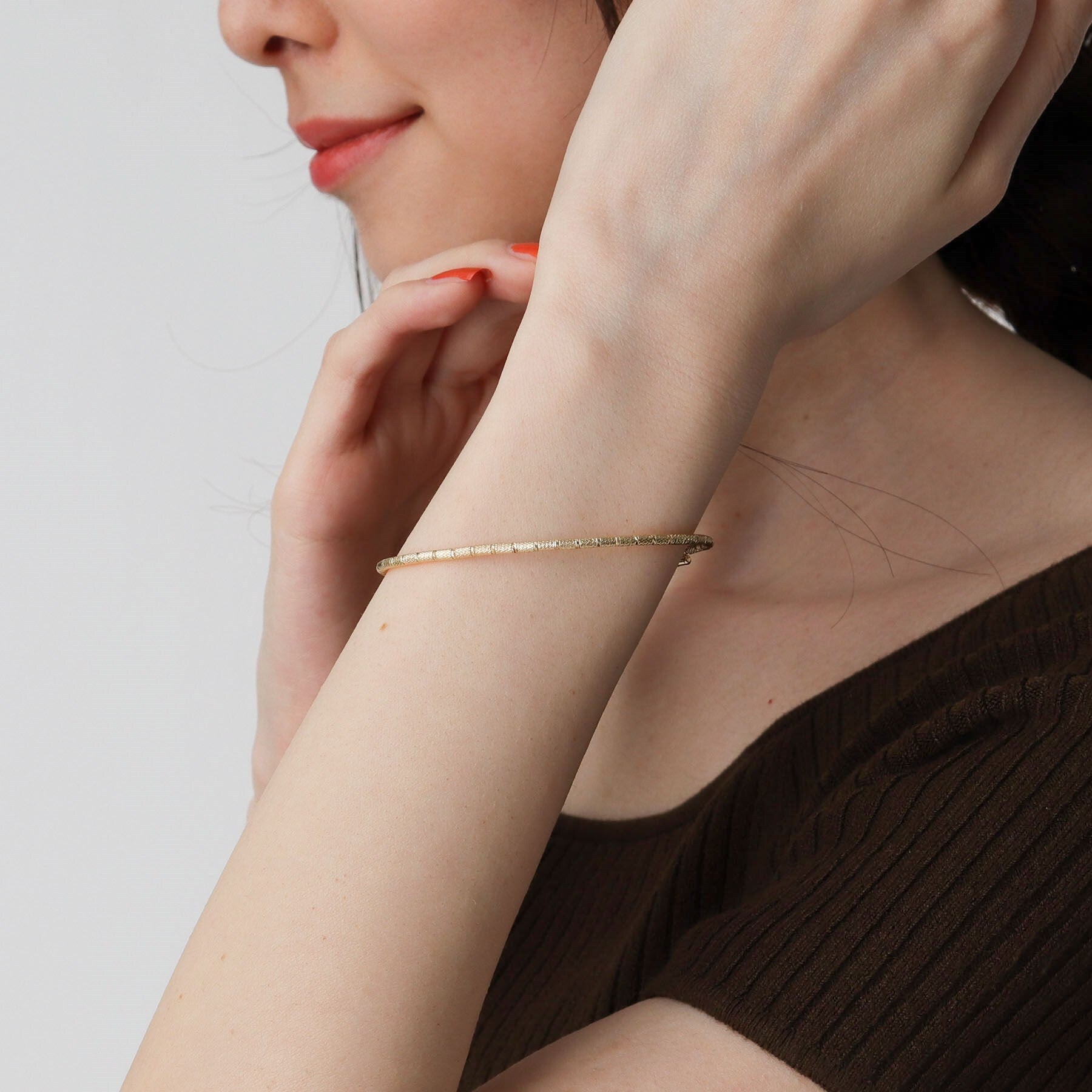 ココシュニック COCOSHNIK K10テクスチャーボール マグネットバングル イエローゴールド(100)