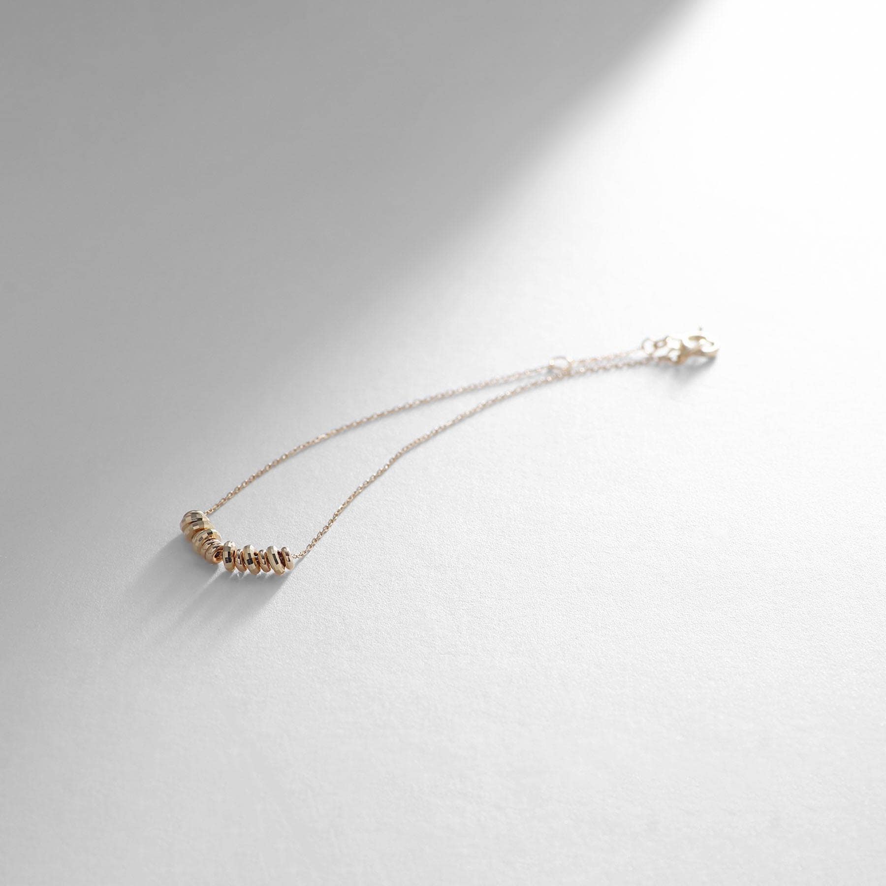 ココシュニック COCOSHNIK K10ランダムドーナツビーズ ブレスレット
