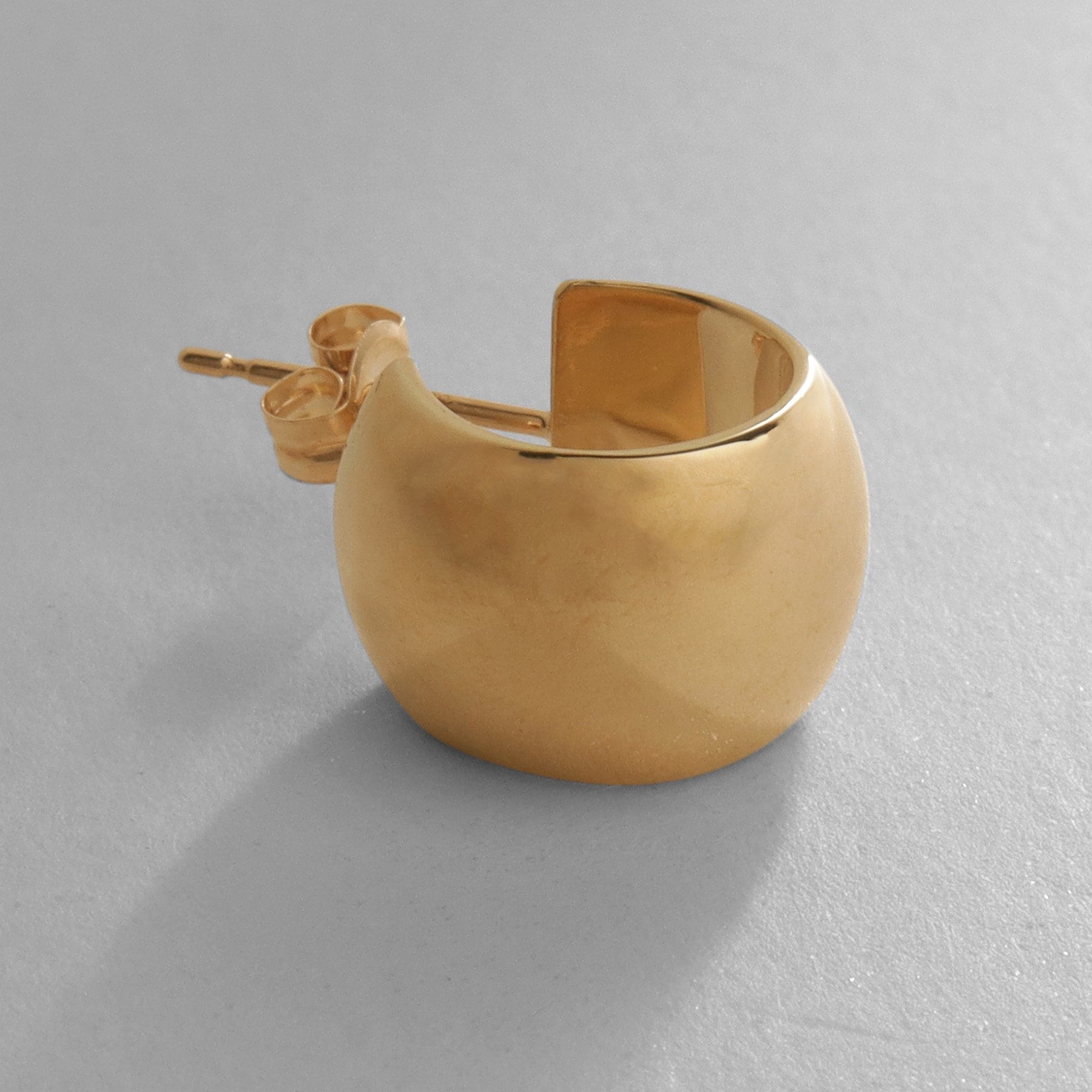 ココシュニック COCOSHNIK K10中空平甲フープ スタッドピアス クリスタル/透明(100)