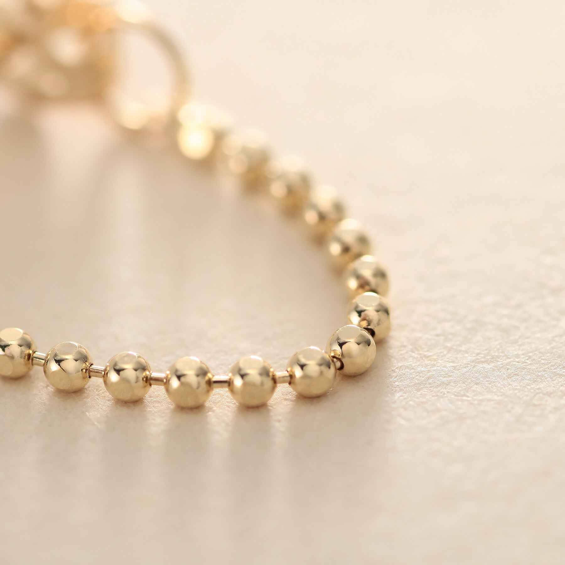 ココシュニック オンキッチュ COCOSHNIK ONKITSCH K10カットボールチェーン フープピアス （イエローゴールド(100)） イエローゴールド(100)