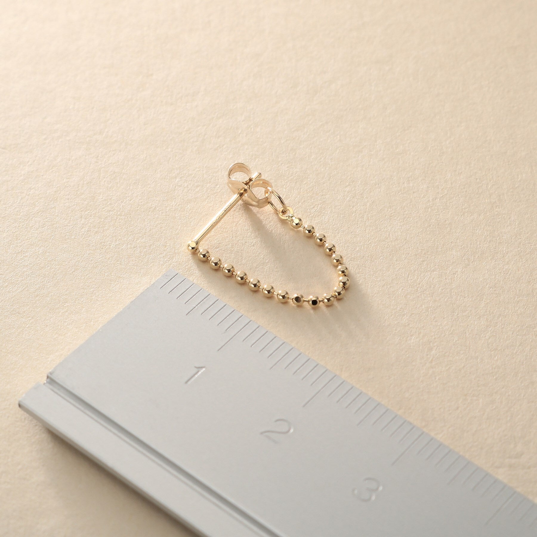 ココシュニック オンキッチュ COCOSHNIK ONKITSCH K10カットボールチェーン フープピアス （イエローゴールド(100)） イエローゴールド(100)