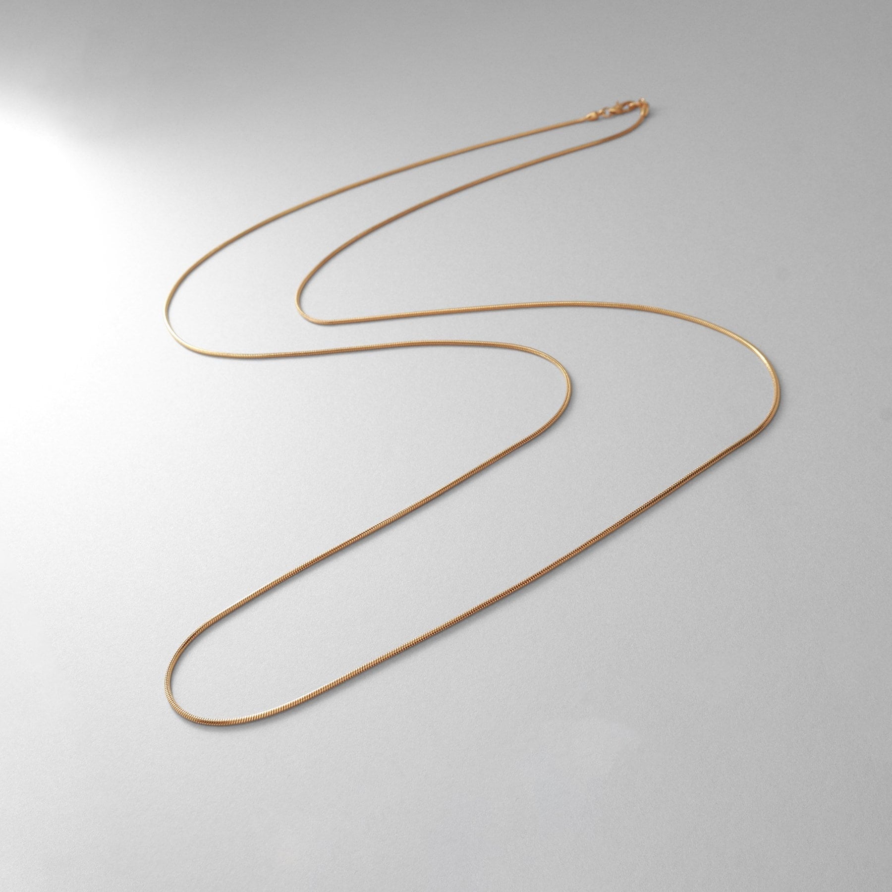 ココシュニック オンキッチュ COCOSHNIK ONKITSCH シルバー デザインチェーン スネークネックレス（90cm） GP （クリスタル/透明(600)） クリスタル/透明(600)