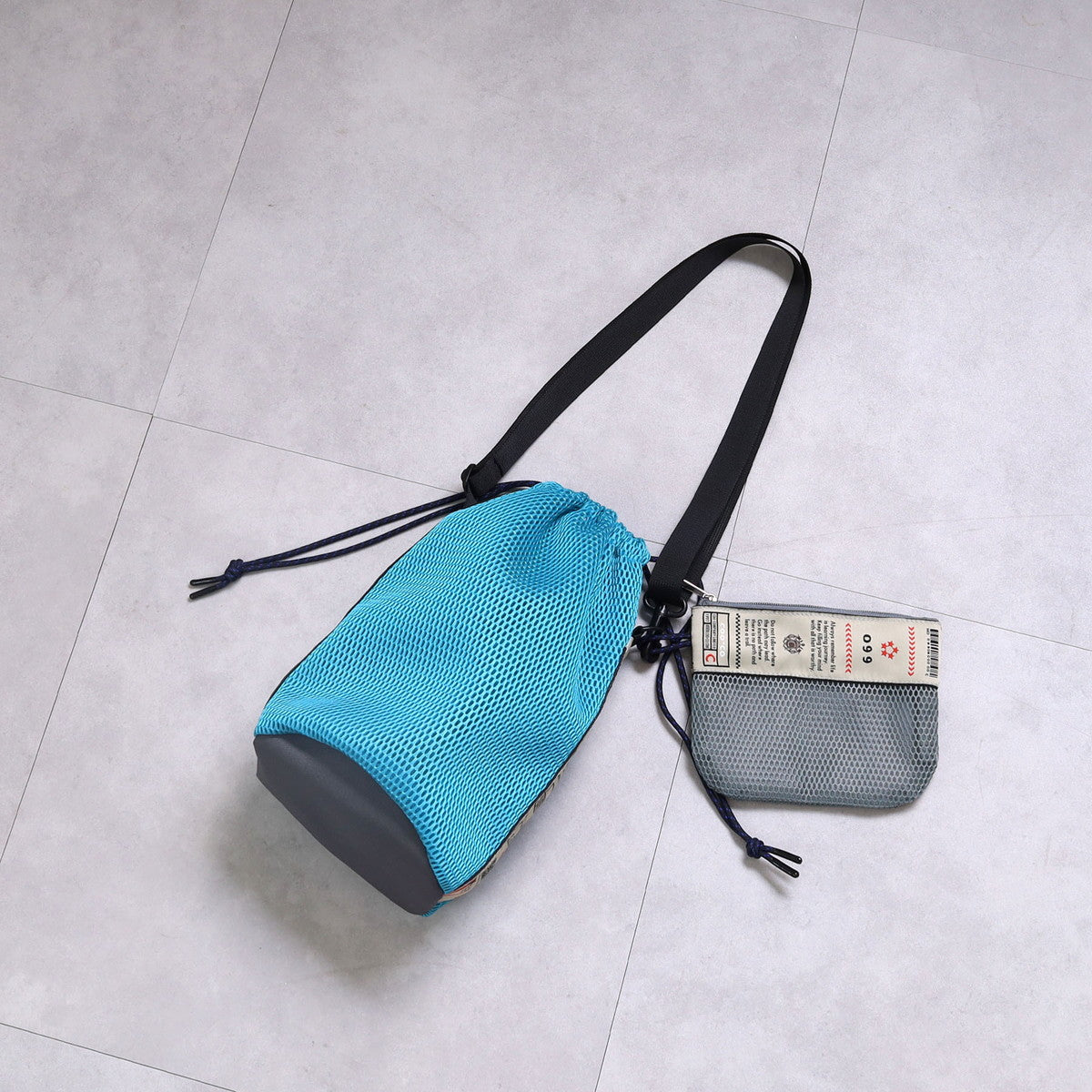 クーコ COOCO ロゴテープメッシュ巾着ショルダーバッグ