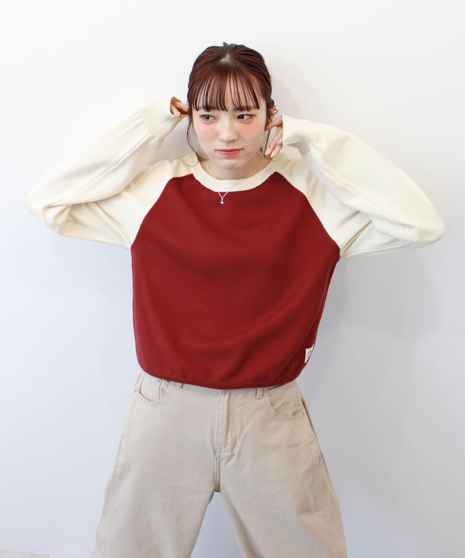 フューティアランド Futier Land タグ付きラグランニットトップス （レッド） レッド