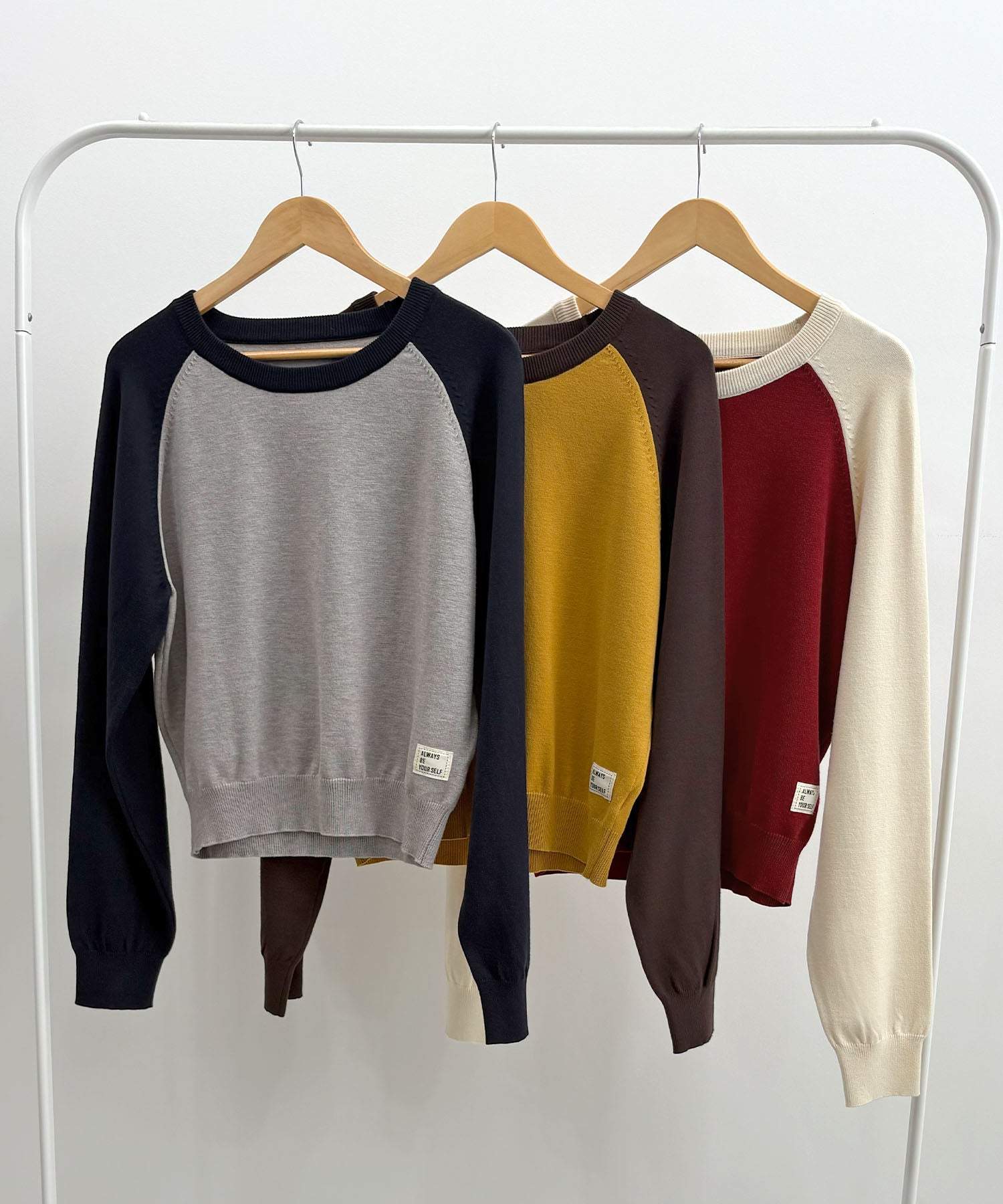 フューティアランド Futier Land タグ付きラグランニットトップス （レッド） レッド