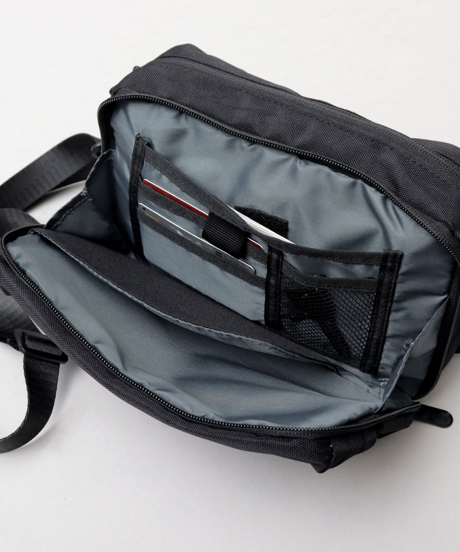 ジェリー GERRY 撥水加工 リサイクルポリエステル REPREVE マルチポケット 横型 ミニショルダーバッグ 旅行