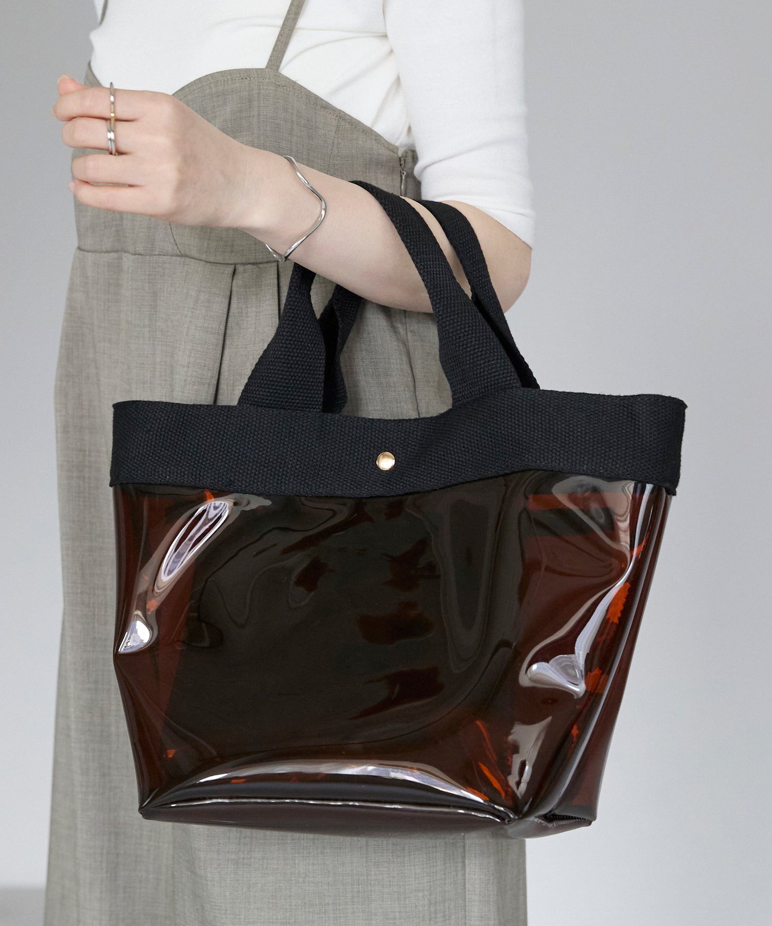 グッシオ GUSCIO PVCバッグ 巾着付き （BROWN） BROWN