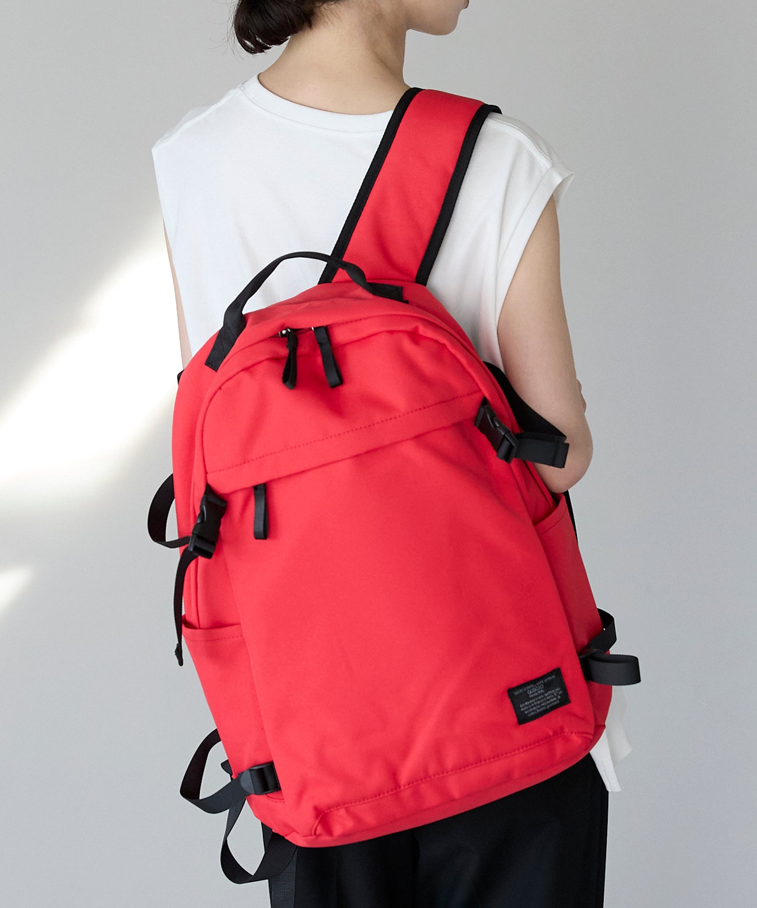 グッシオ GUSCIO ナイロンバックパック （ORANGE） ORANGE