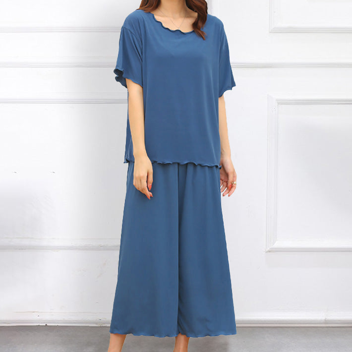 AIKA ica Highly stretchy thin ribbed cut and sew with mellow hem design Plain loose short sleeve T-shirt and 3/4 length wide pants Pajama top and bottom set