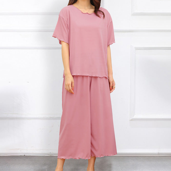 AIKA ica Highly stretchy thin ribbed cut and sew with mellow hem design Plain loose short sleeve T-shirt and 3/4 length wide pants Pajama top and bottom set