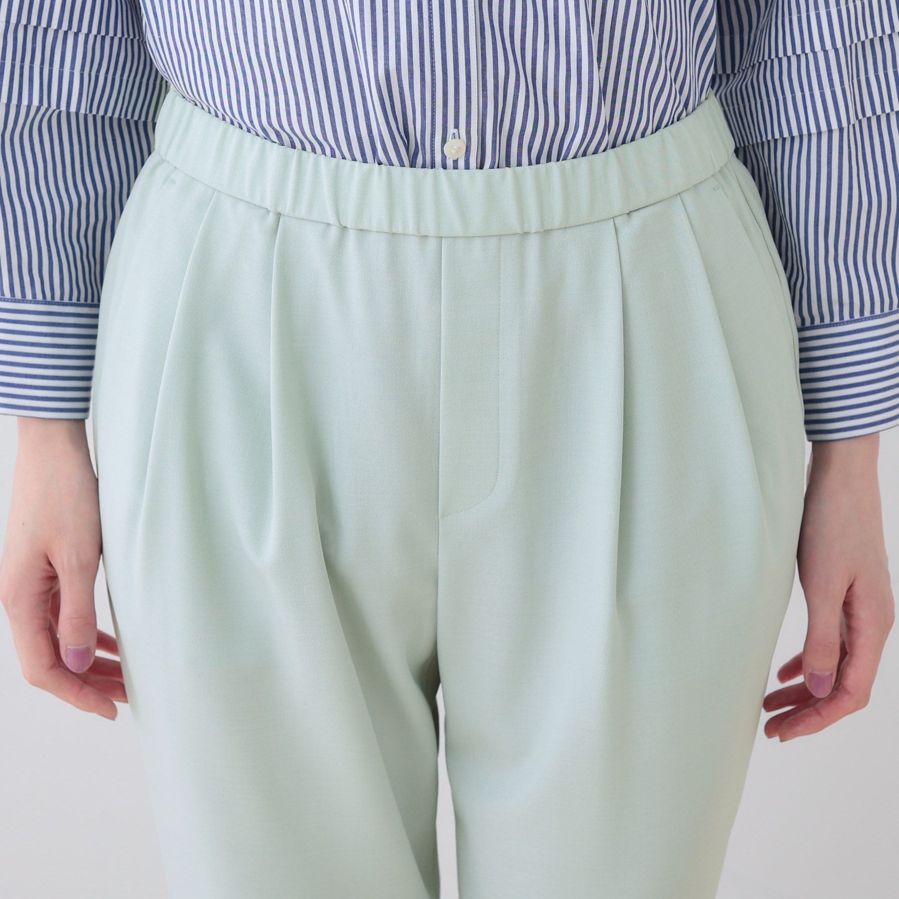 インディヴィ INDIVI 【洗える／ストレッチ】タックテーパードパンツ （ライトベージュ(051)） ライトベージュ(051)