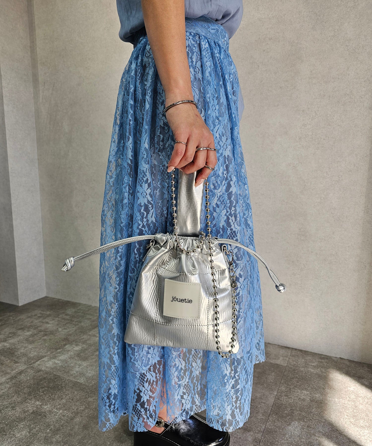 Jouetie Metallic PU Quilted Drawstring Shoulder Bag