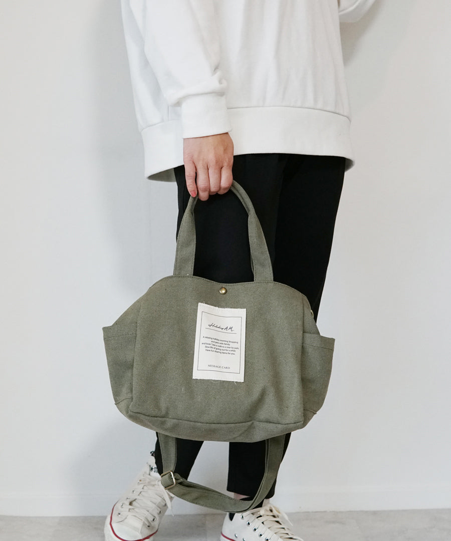 ホリデーエーエム Holiday A.M. バッグ ショルダーバッグ メッセージラベル レディース メンズ キャンバス 帆布 Keys （IVORY） IVORY