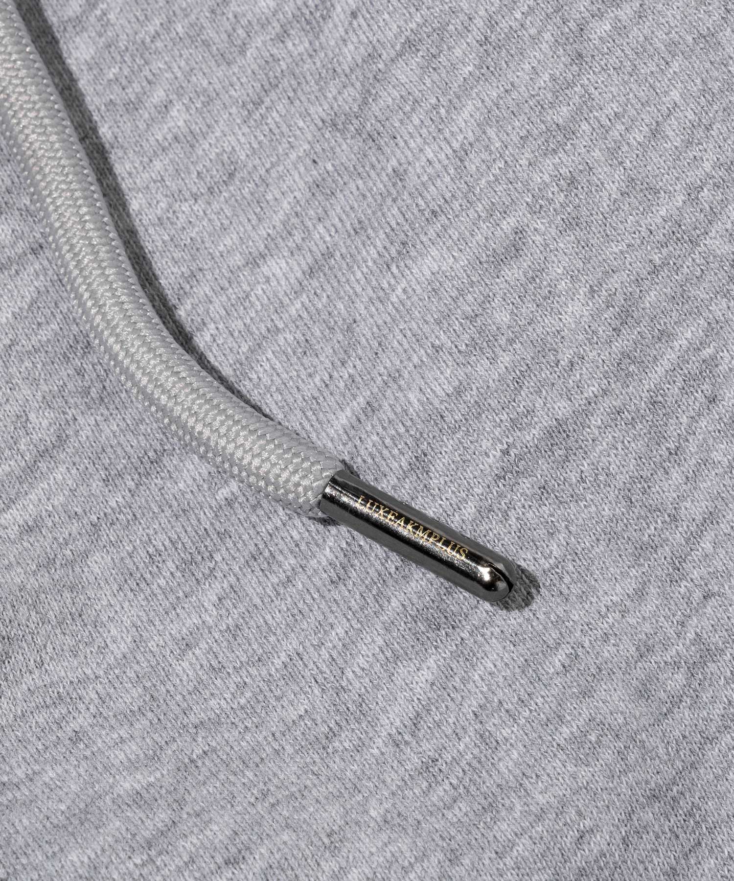リュクスエイケイエムプラス LUXEAKMPLUS ゴルフ ブランドロゴ テーパードシルエット トレーニング ロングパンツ(ストレッチ性/吸水速乾) （グレー） グレー