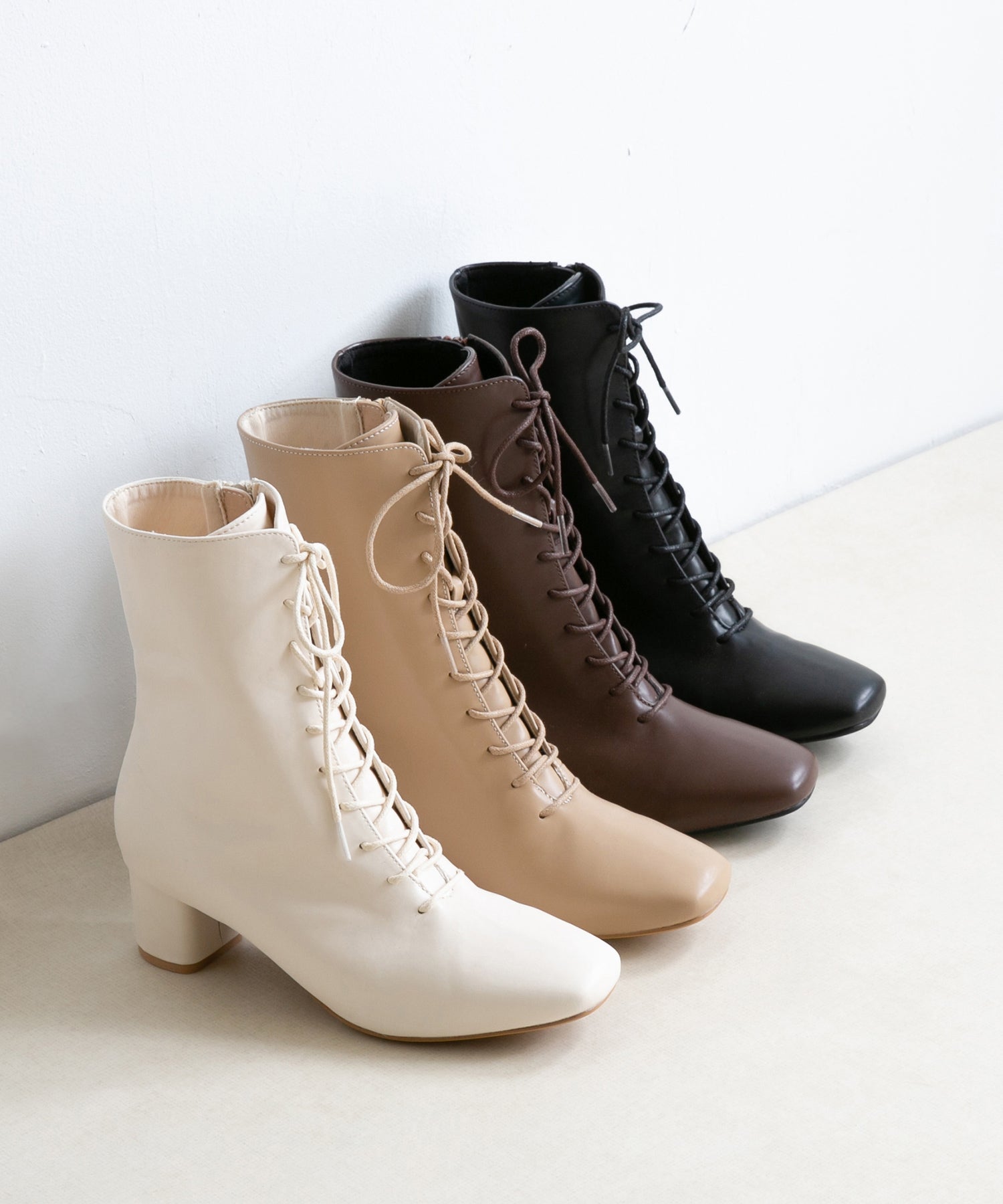 Menue square toe lace-up heel boots