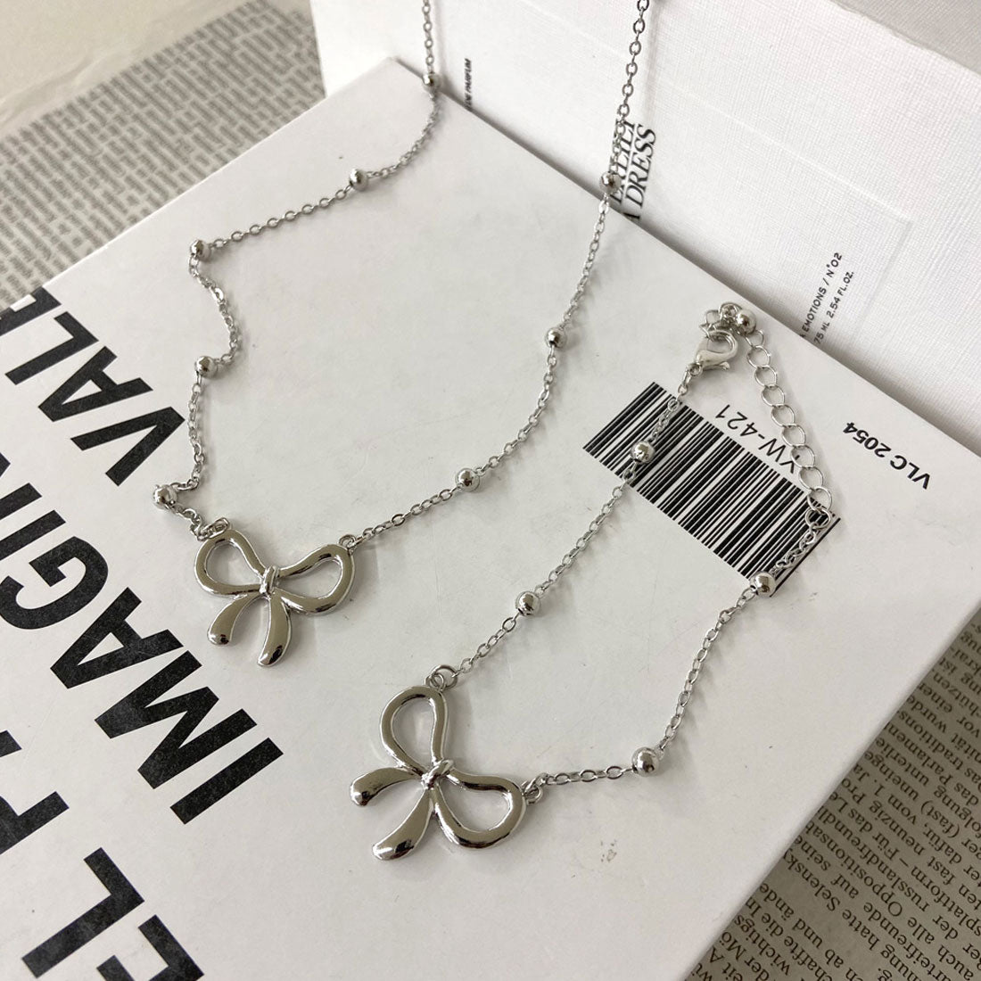 ノンヘッジ non-hedge リボンネックレス・ブレスレットセット （シルバー） シルバー