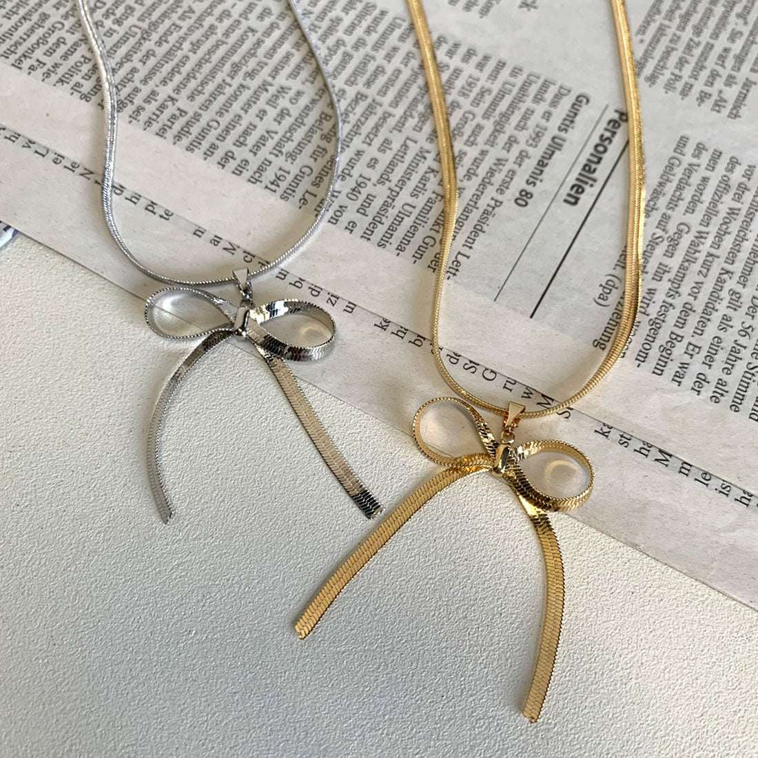 ノンヘッジ non-hedge チェーンリボンネックレス （ゴールド） ゴールド