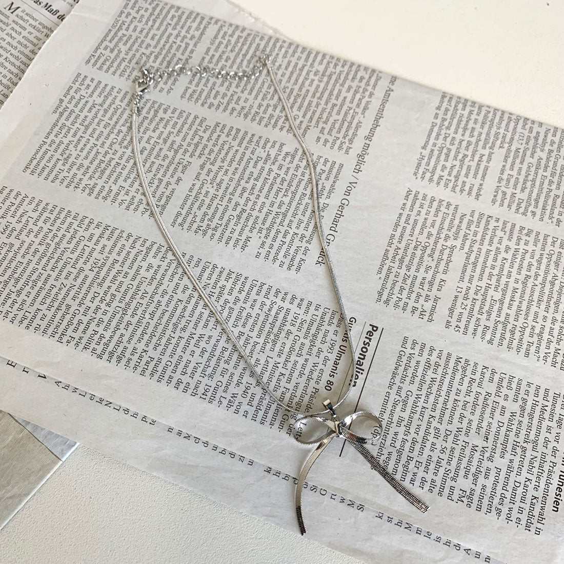 ノンヘッジ non-hedge チェーンリボンネックレス （ゴールド） ゴールド