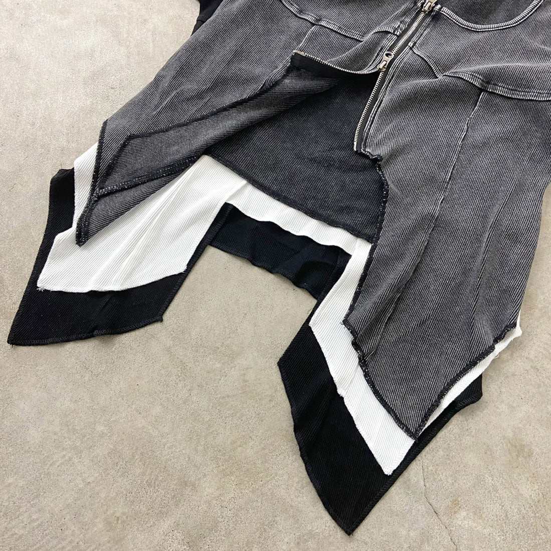 ノンヘッジ non-hedge リブZIPイレギュラーヘムトップス （ブラック） ブラック