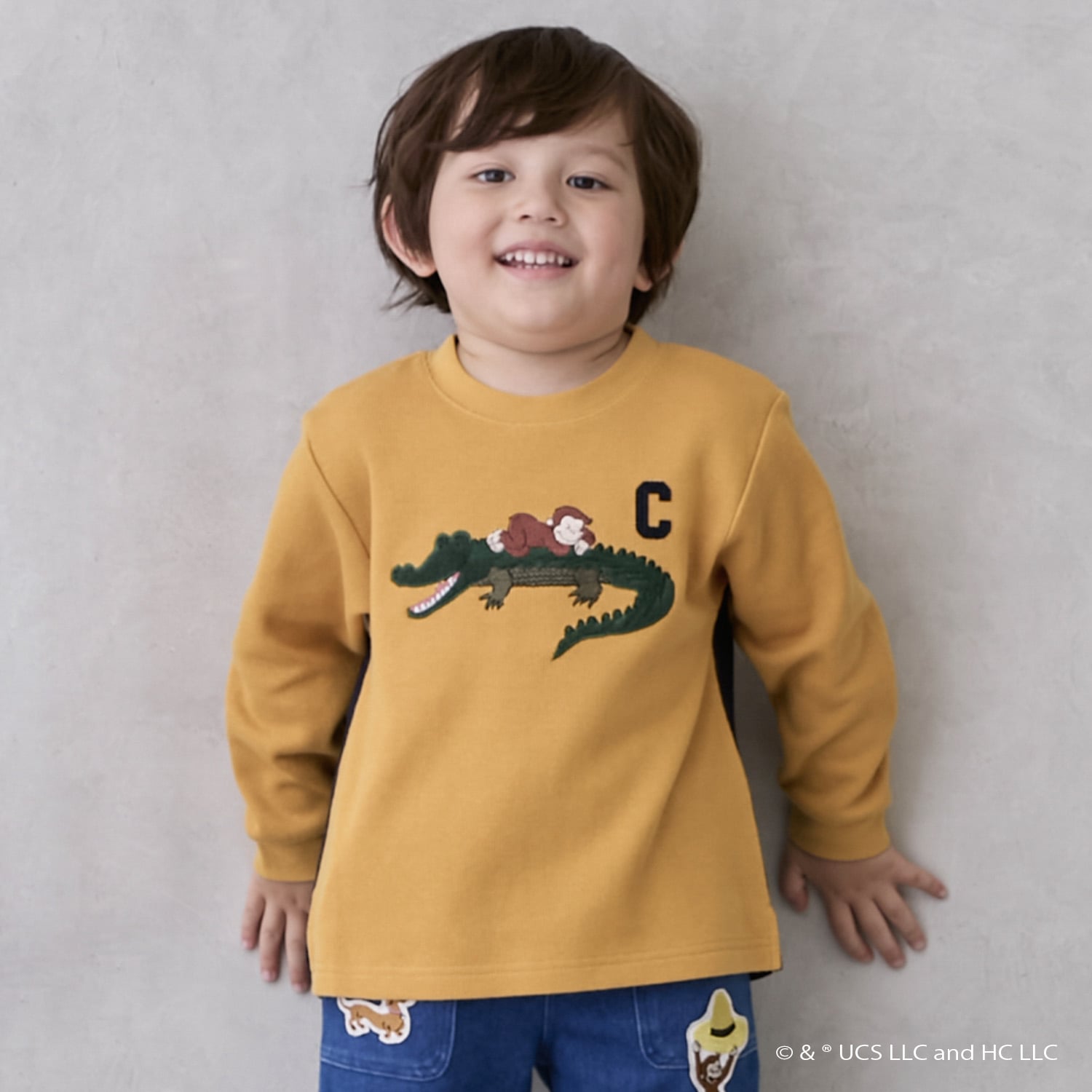 プティマイン petit main 【おさるのジョージ】接結アップリケ長袖Tシャツ （クリーム） クリーム