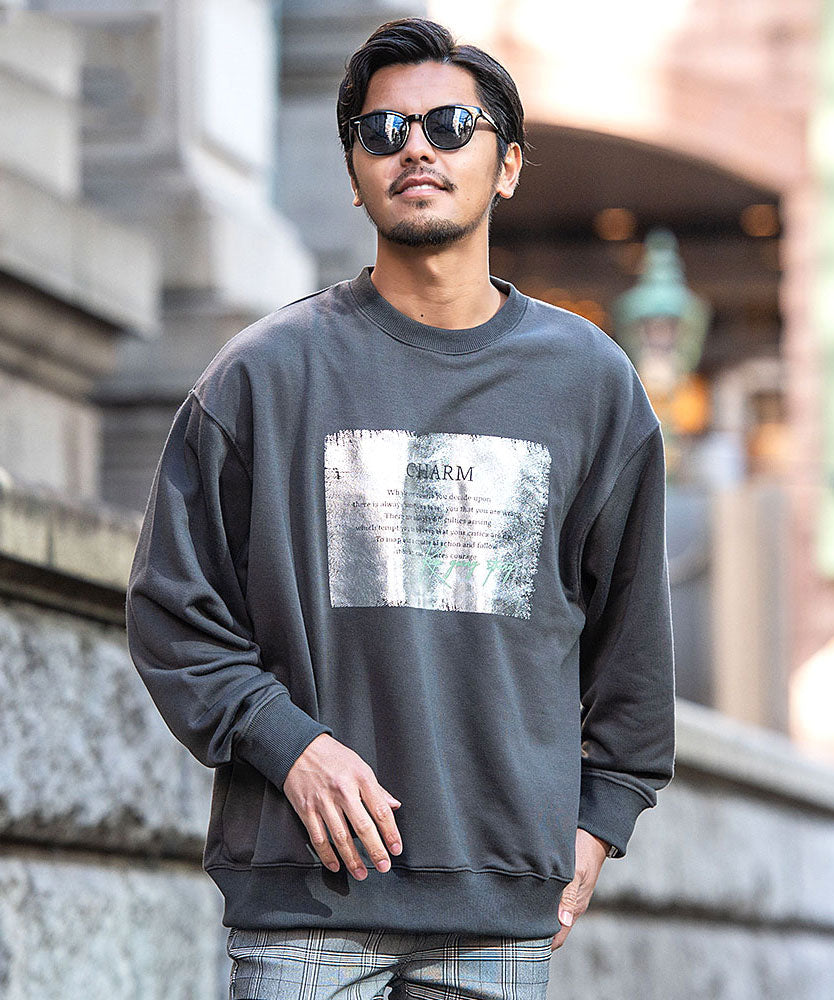 キャバリア CavariA CavariA クルーネック シルバー箔プリント長袖トレーナー