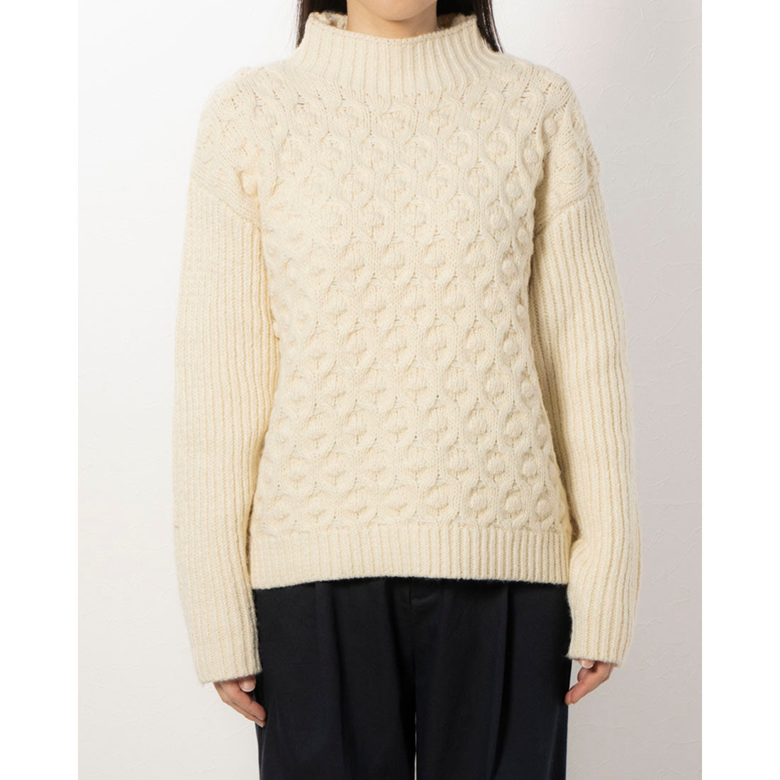 RANAN High-neck knit with a pogo design