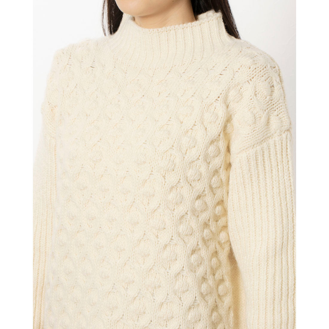 RANAN High-neck knit with a pogo design