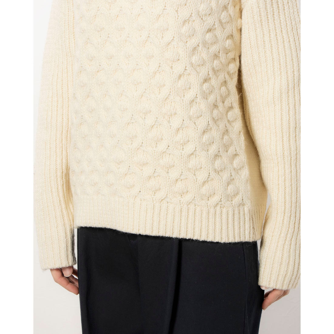RANAN High-neck knit with a pogo design