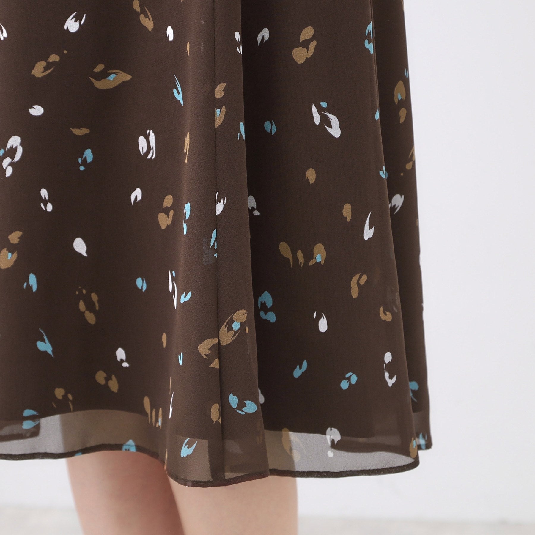 リフレクト Reflect 【ウエストリボン付き】フレアプリントワンピース （ネイビー(194)） ネイビー(194)