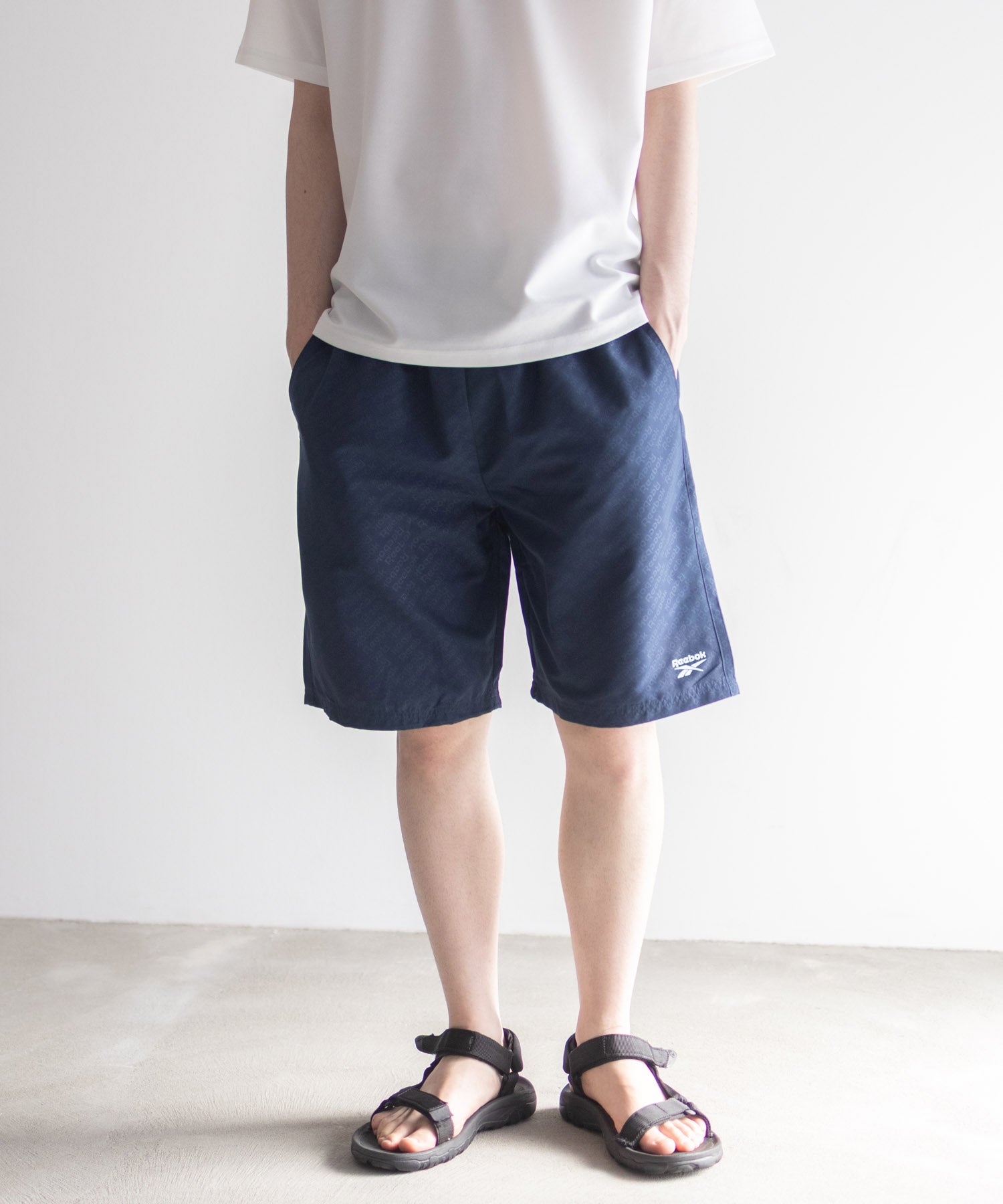 リーボック Reebok エンボスサーフショートパンツ （ネイビー） ネイビー