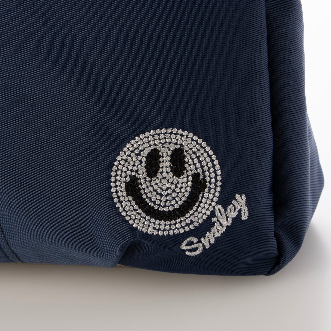 スマイリーフェイス SMILEY FACE スマイルナイロンショルダーバッグ（メタリックアクセント） （オレンジ） オレンジ