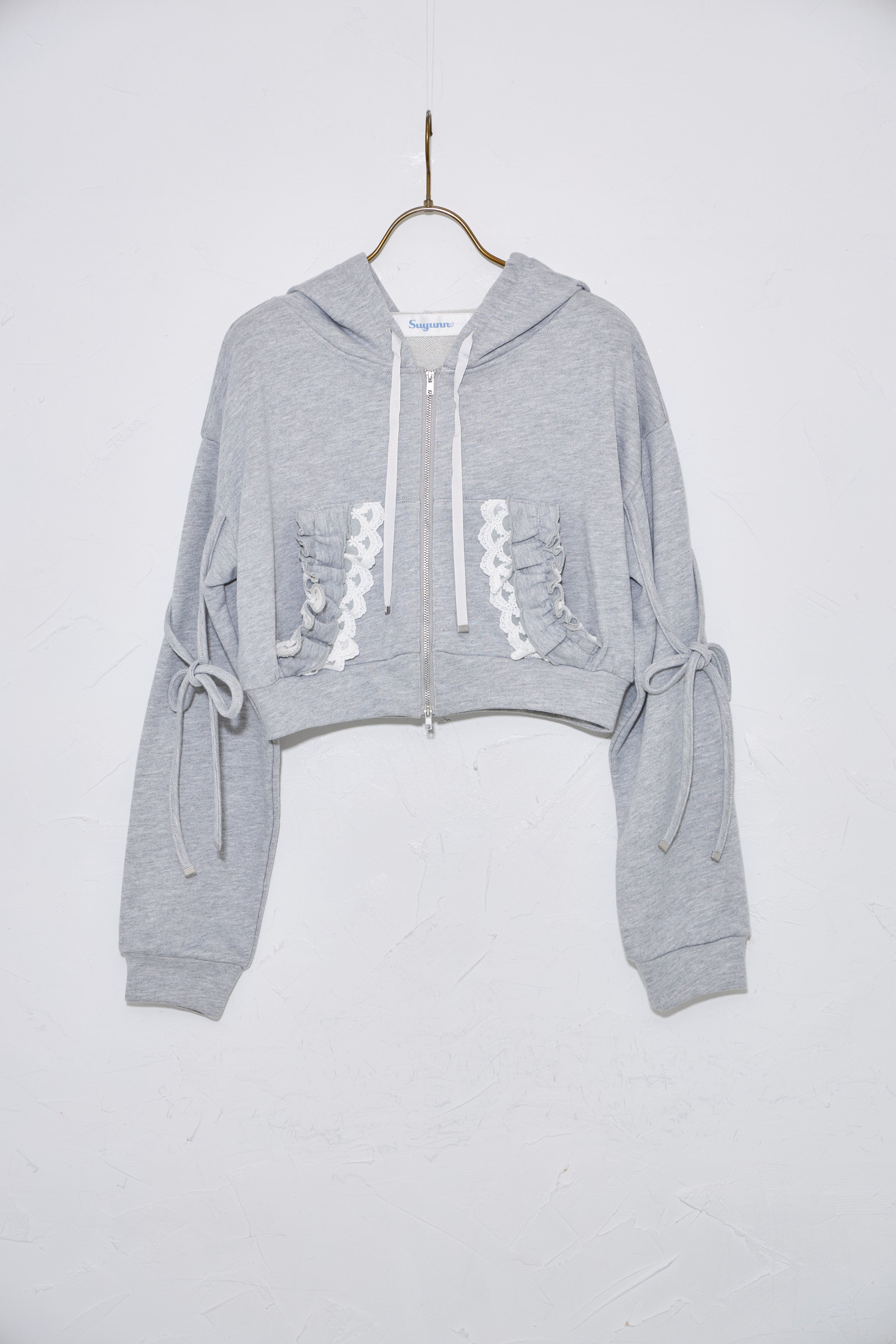 スユン Suyunn リボン付きレースフリルパーカー グレー