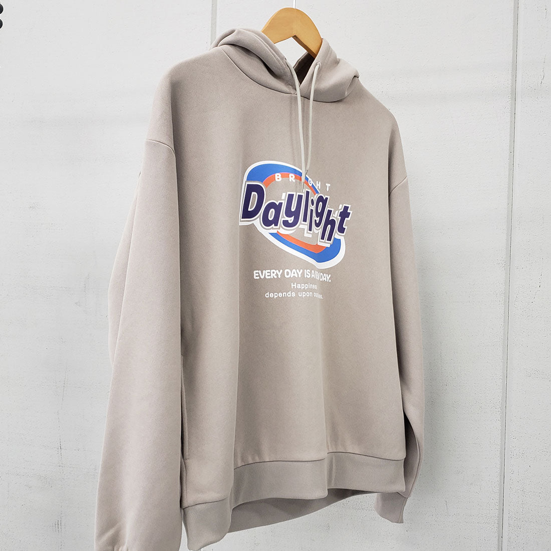 スピリトーゾ Spiritoso daylightビッグプリント裏起毛パーカー