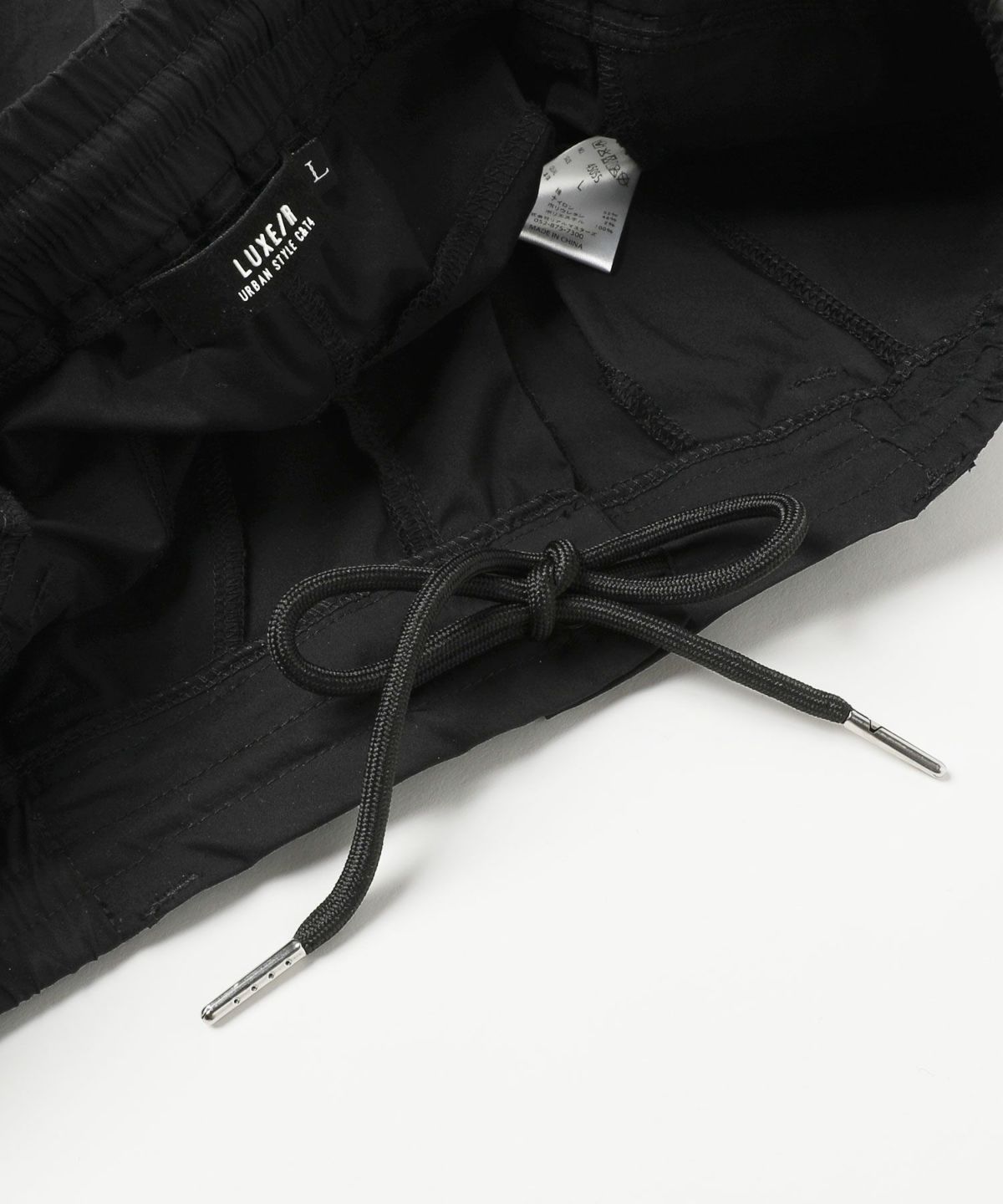 カジュアル THE CASUAL LUXE/R ベルトループ付き ストレッチ 布帛 裾 リブ ジョガーパンツ