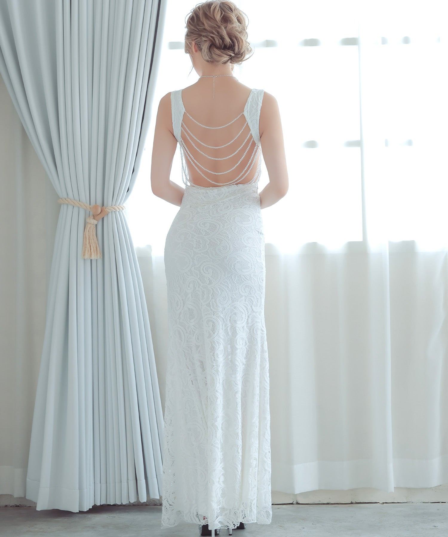 ティカ Tika バックビジューノースリーブスリットタイトロングドレス