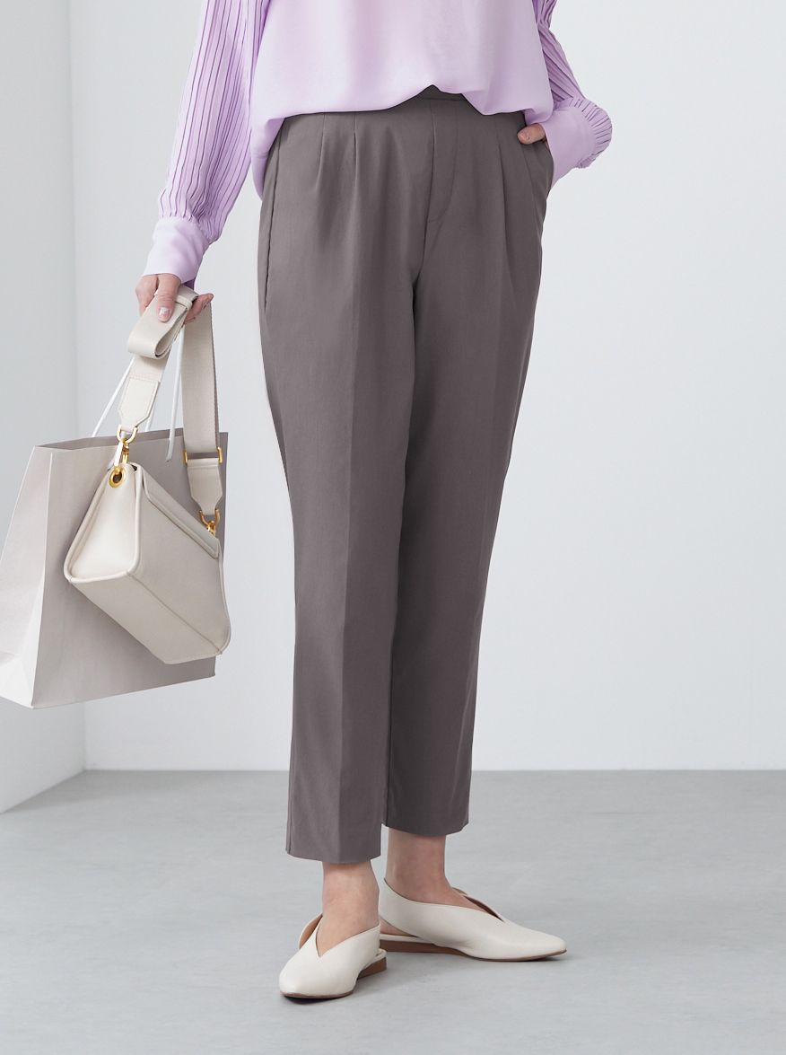 トゥシェ Tuche ストレッチパンツ テーパードスタイル レーヨン混 アンクル丈