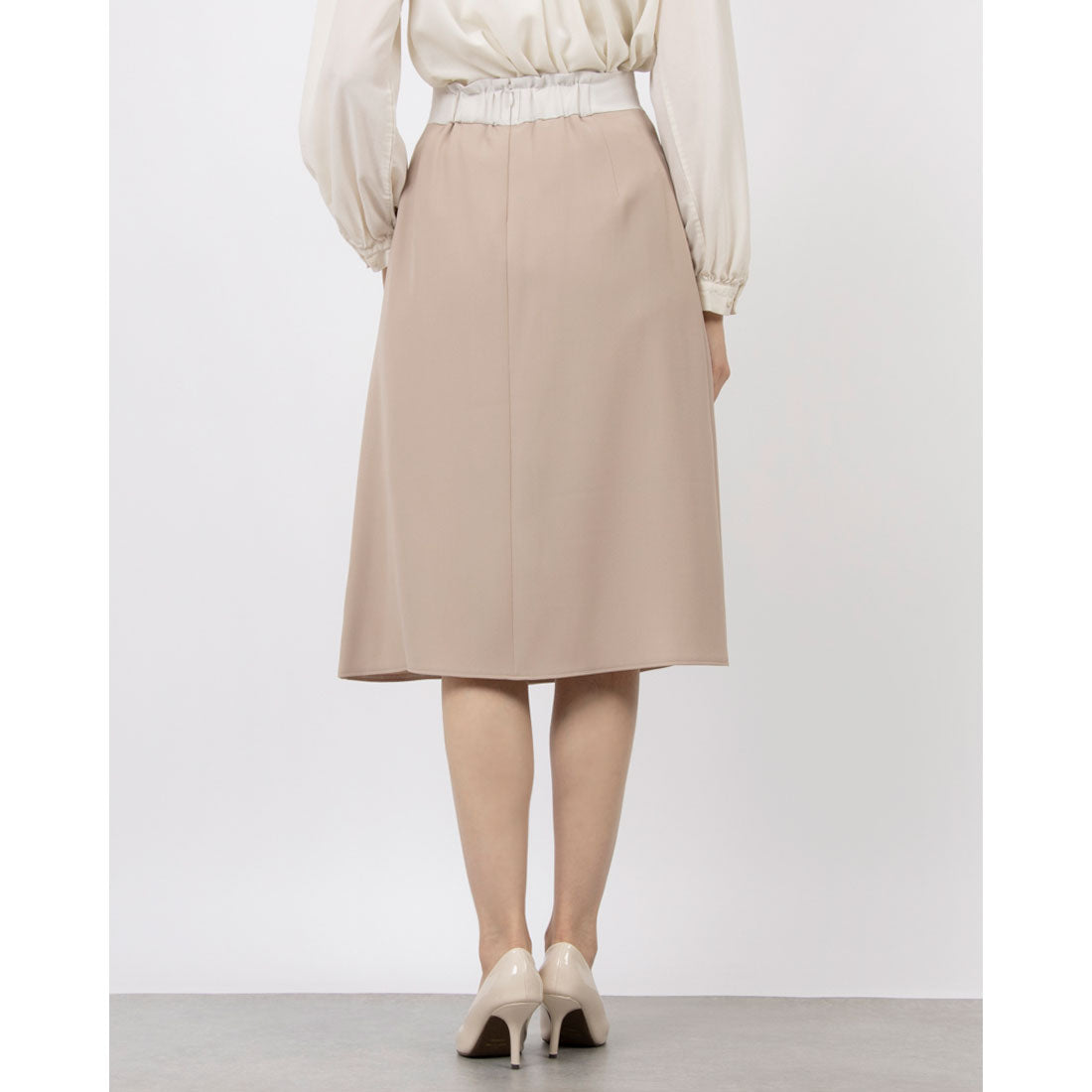 トーナル TONAL バイカラーハトメトラペーズスカート ベージュ