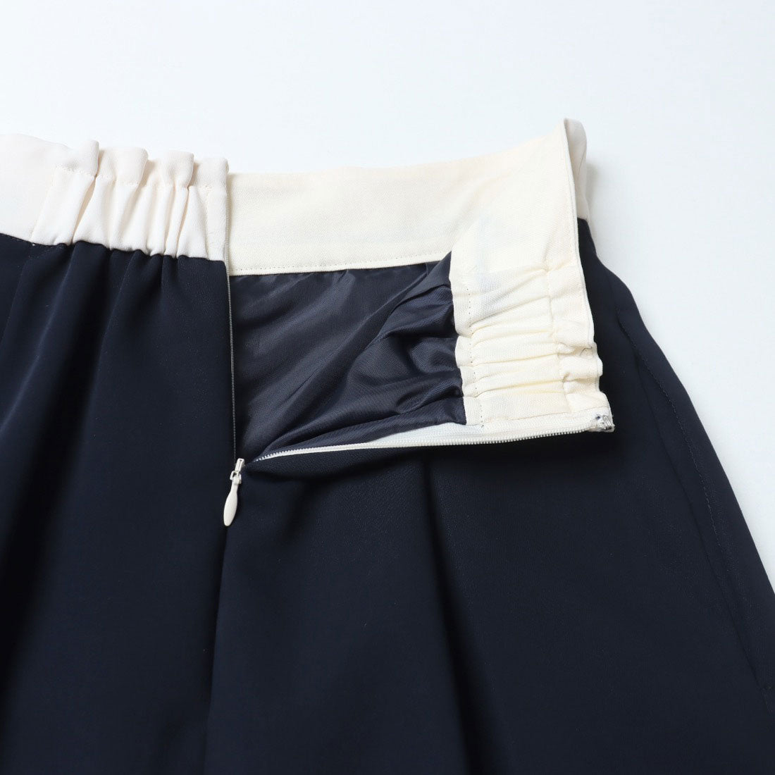 トーナル TONAL バイカラービットアシメタイトスカート