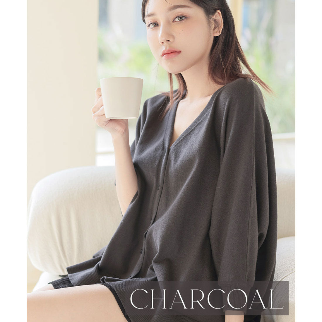 "Tu-Hacci nursing cape cardigan that can also be used as a nursing cover."