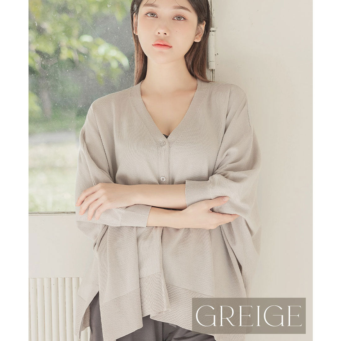 "Tu-Hacci nursing cape cardigan that can also be used as a nursing cover."