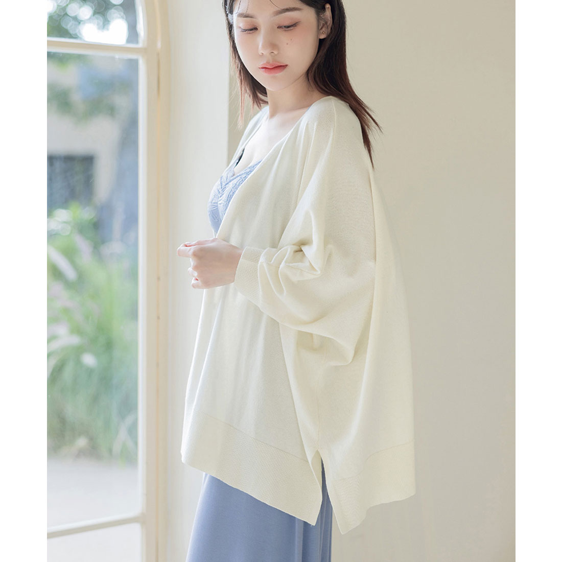 "Tu-Hacci nursing cape cardigan that can also be used as a nursing cover."