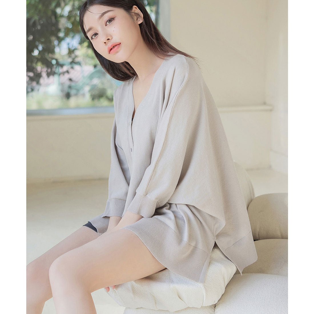 "Tu-Hacci nursing cape cardigan that can also be used as a nursing cover."