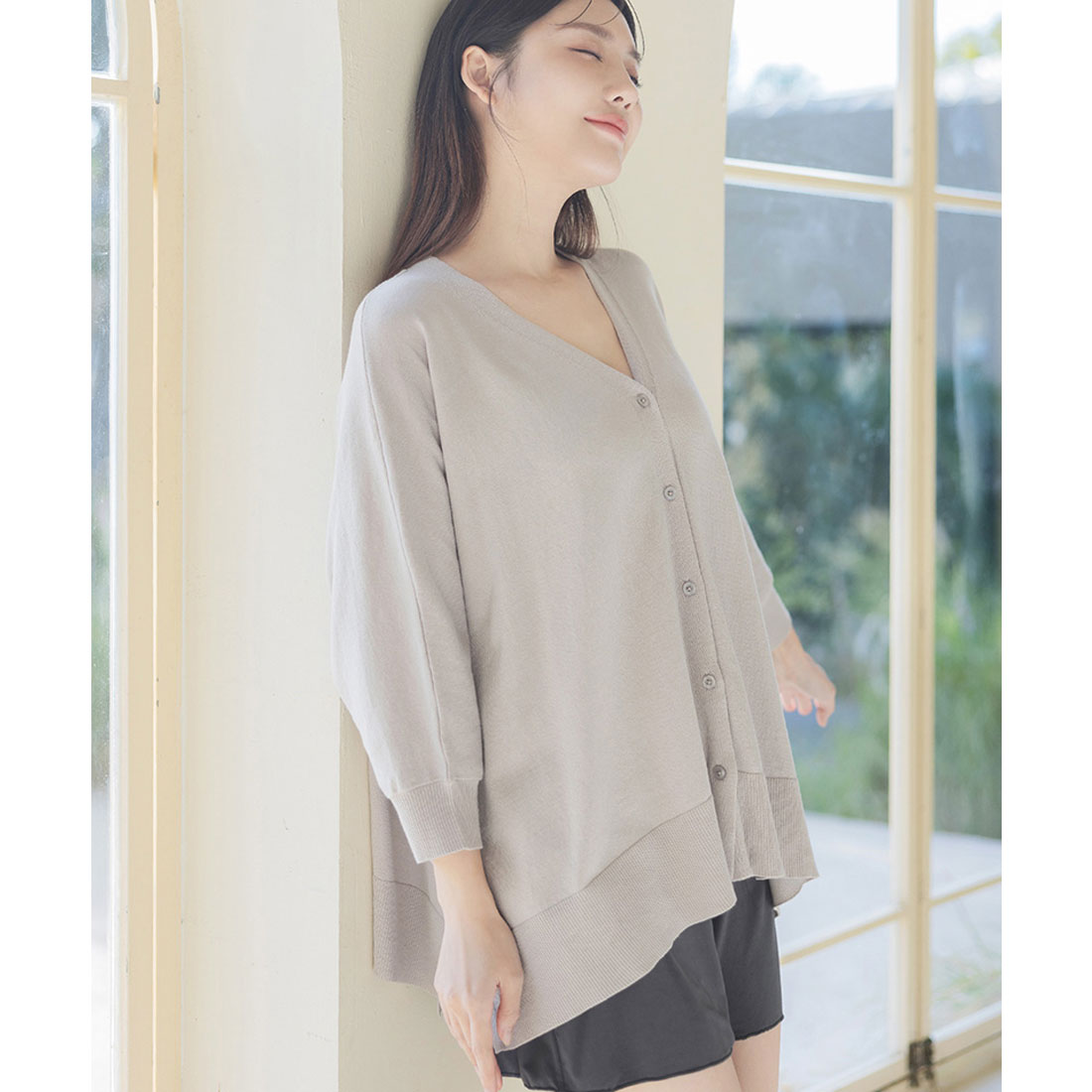 "Tu-Hacci nursing cape cardigan that can also be used as a nursing cover."