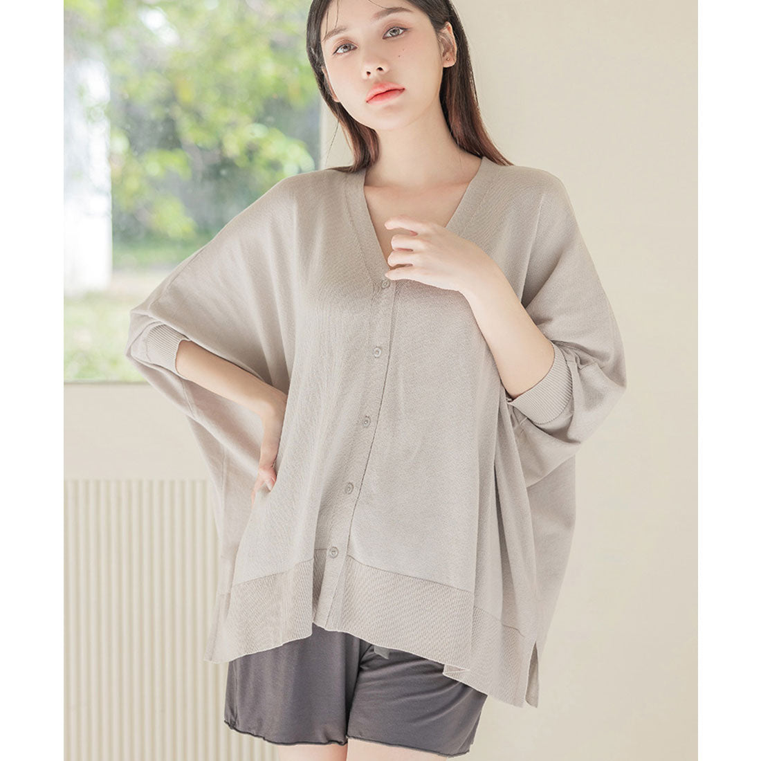 "Tu-Hacci nursing cape cardigan that can also be used as a nursing cover."
