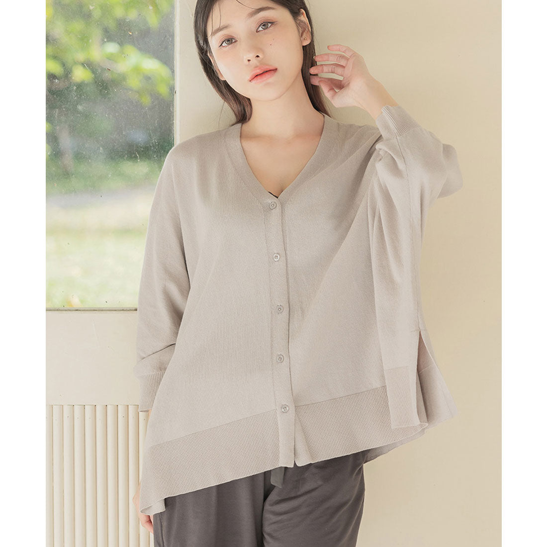 "Tu-Hacci nursing cape cardigan that can also be used as a nursing cover."