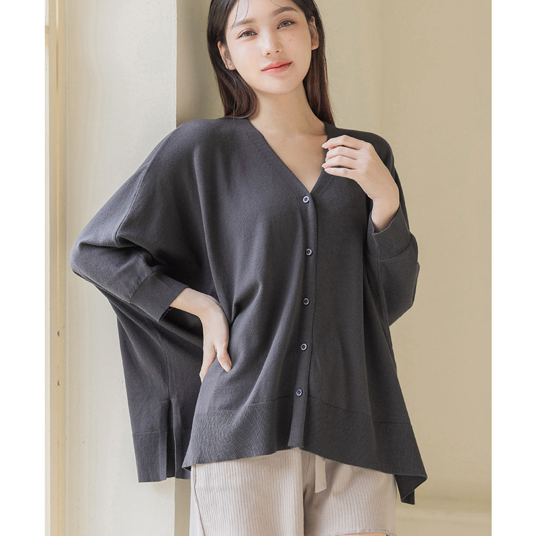 "Tu-Hacci nursing cape cardigan that can also be used as a nursing cover."