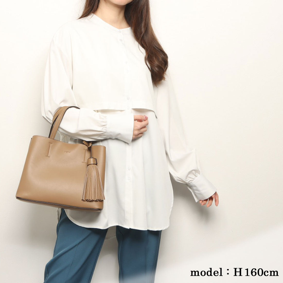 アングリッド Ungrid ビッグタッセル ハンドバッグ （IVO） IVO